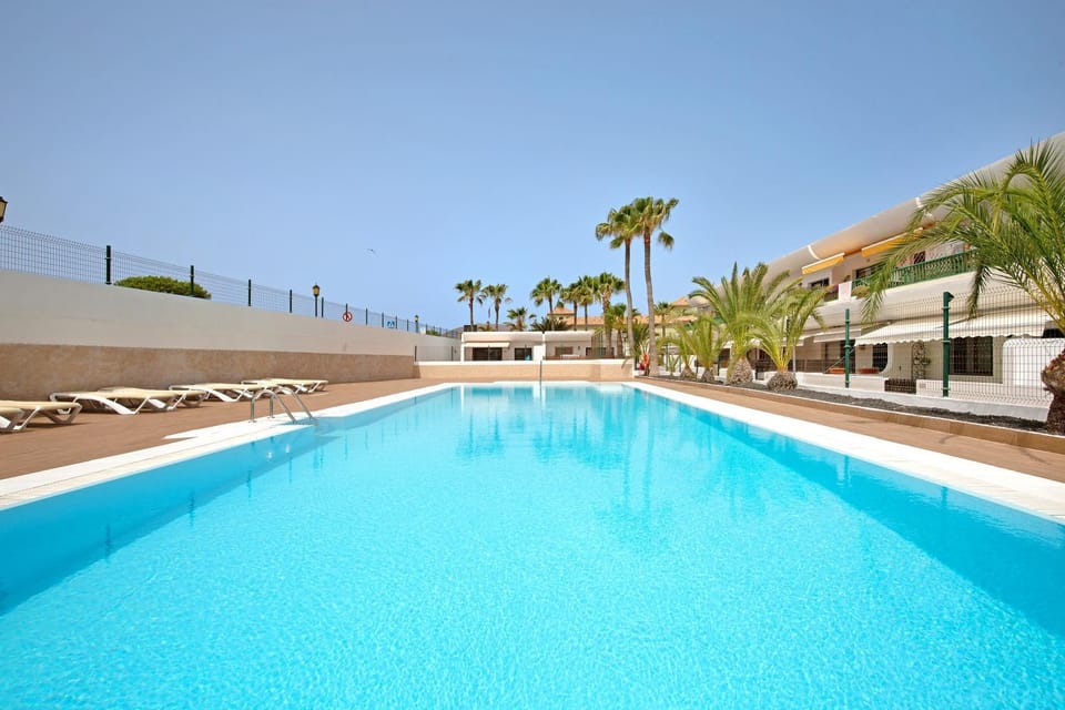 Property building, Living room, Swimming pool