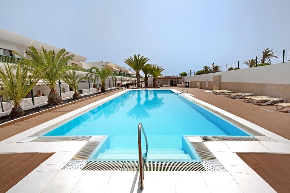 Property building, Living room, Swimming pool