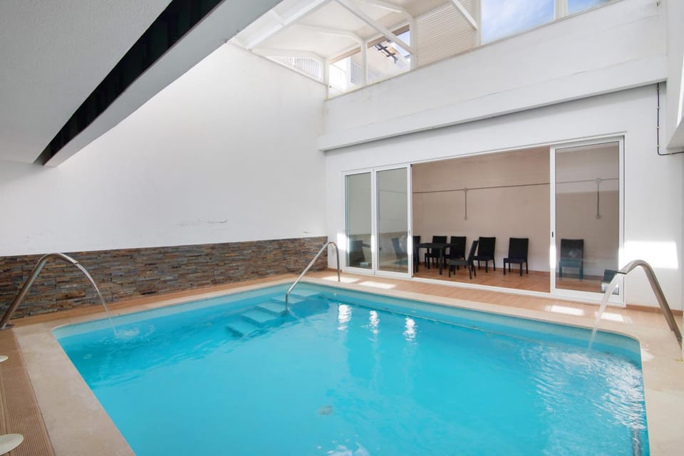 Property building, Living room, Swimming pool