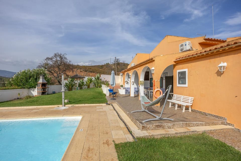 Property building, Living room, Swimming pool