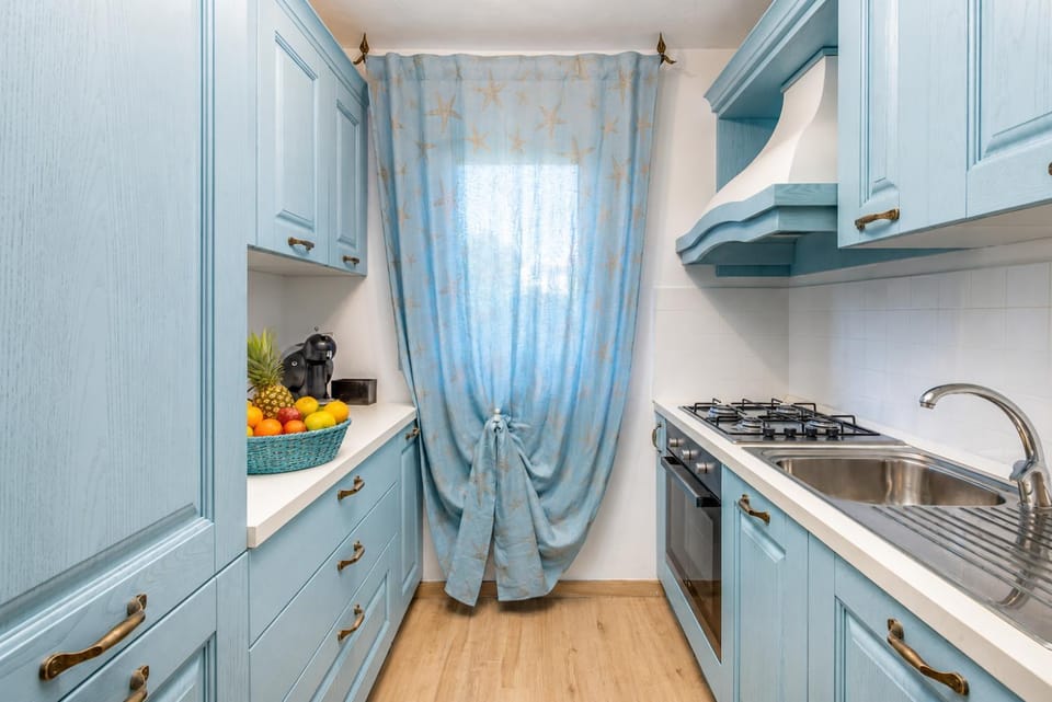 Kitchen or kitchenette, stove