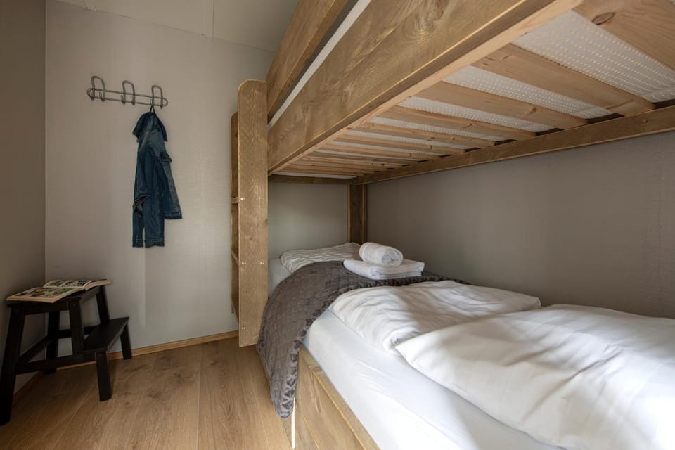 Bedroom, bunk bed, towels, wardrobe