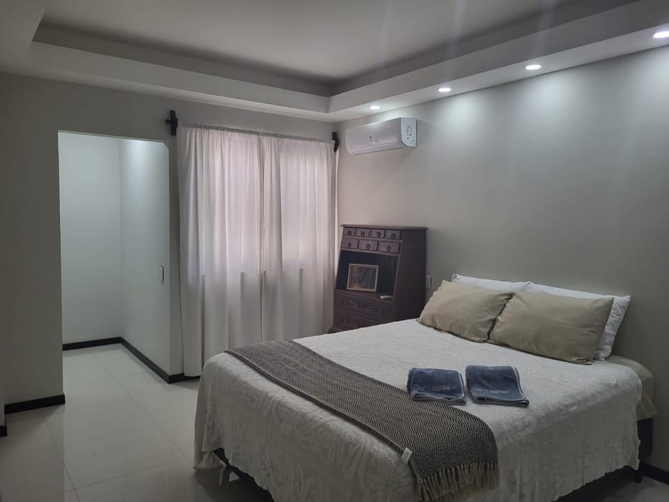 Bed, Bedroom, fireplace, air conditioner