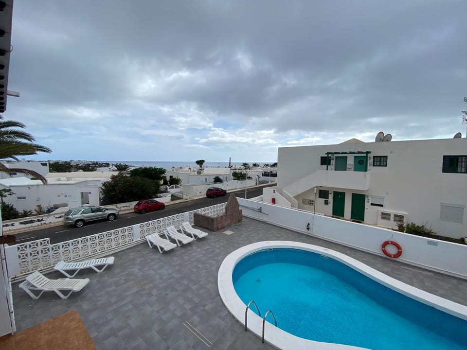 Property building, Day, View (from property/room), Pool view, Sea view, Swimming pool, sunbed