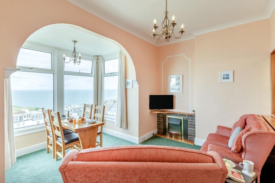 Natural landscape, TV and multimedia, Living room, Seating area, Dining area, Sea view