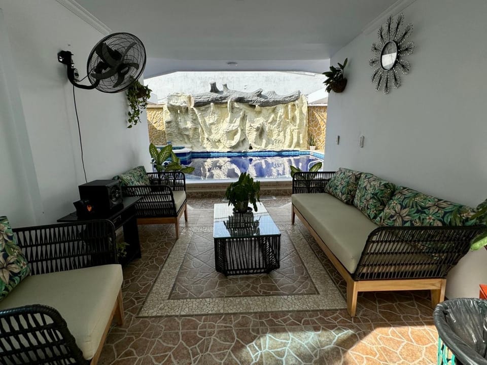 Living room, Seating area, Pool view, Swimming pool