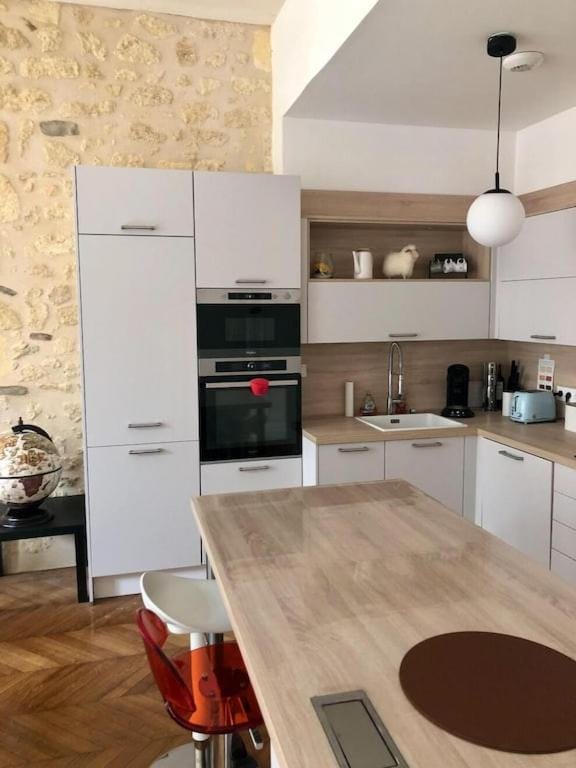 Dining area, dishwasher, oven, toaster
