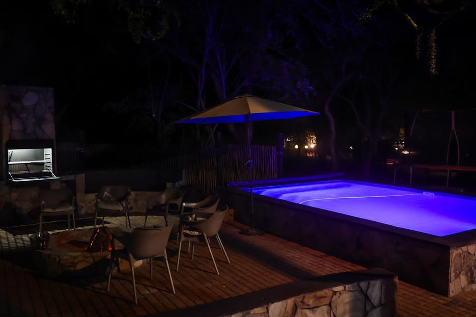 Patio, Night, Natural landscape, Pool view, Swimming pool, sunbed