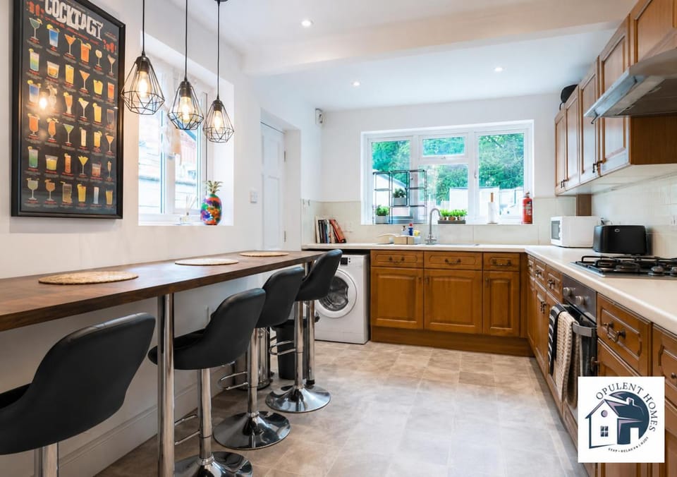 Kitchen or kitchenette, Dining area, dishwasher, stove, toaster