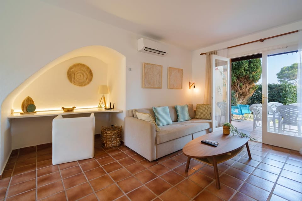 Living room, Seating area, Garden view, air conditioner