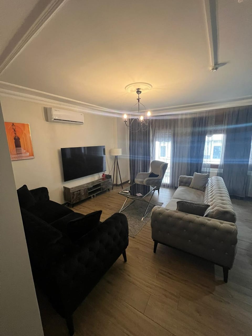 Communal lounge/ TV room, TV and multimedia, Living room, Seating area, air conditioner