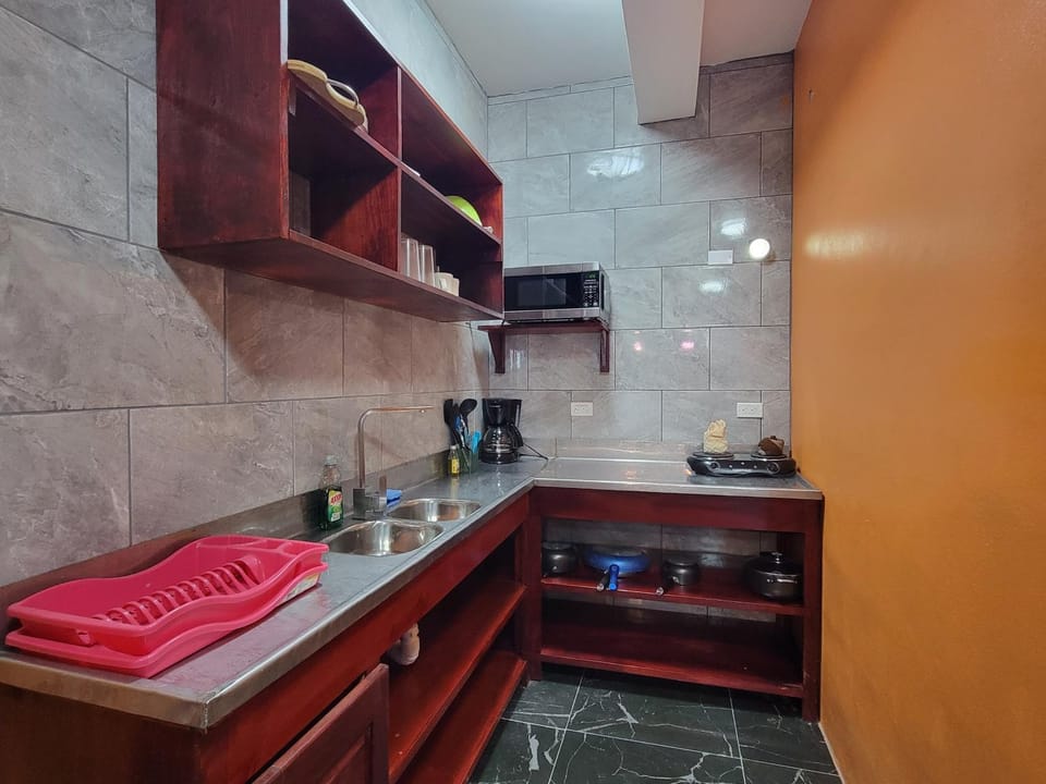 Kitchen or kitchenette, stove, toaster