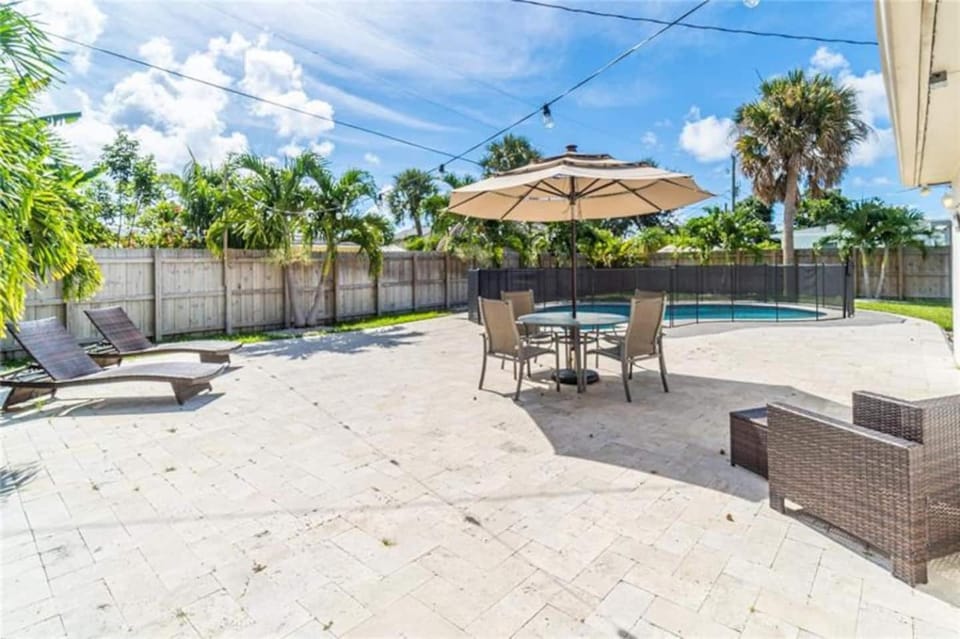 Home wpool by Dream Vacation unit DFS House in Deerfield Beach
