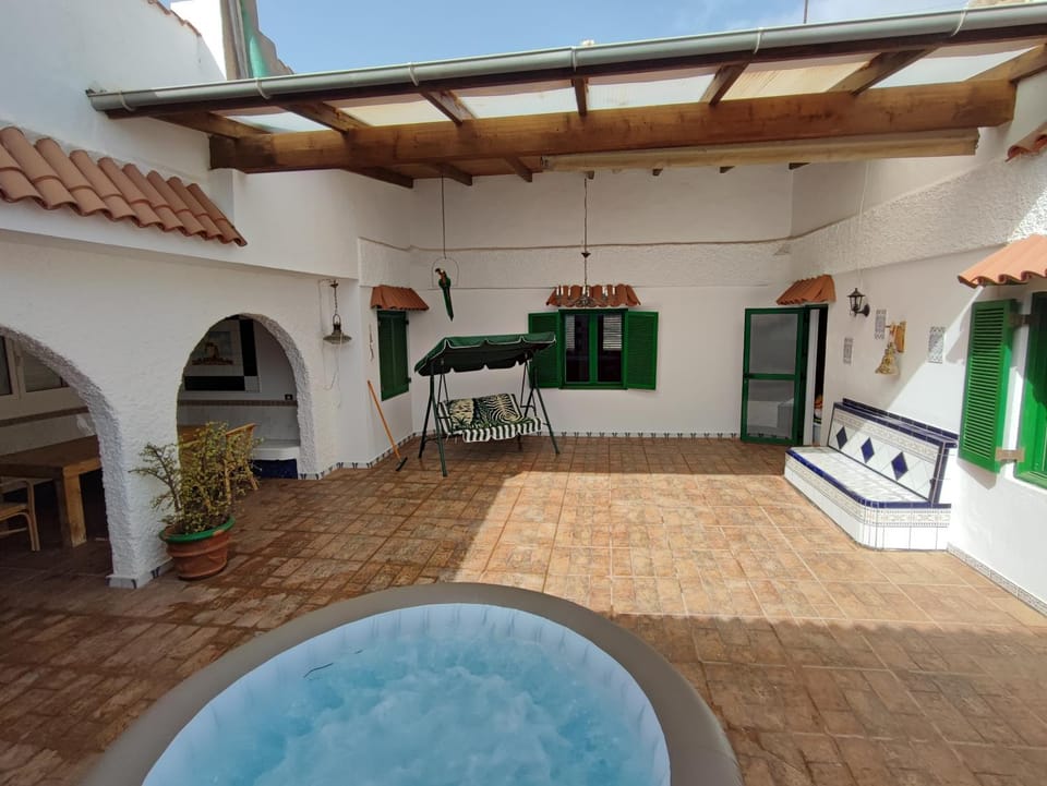 Property building, Patio, Day, View (from property/room), Swimming pool