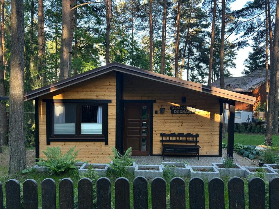 Domek obity dechami House in Poland