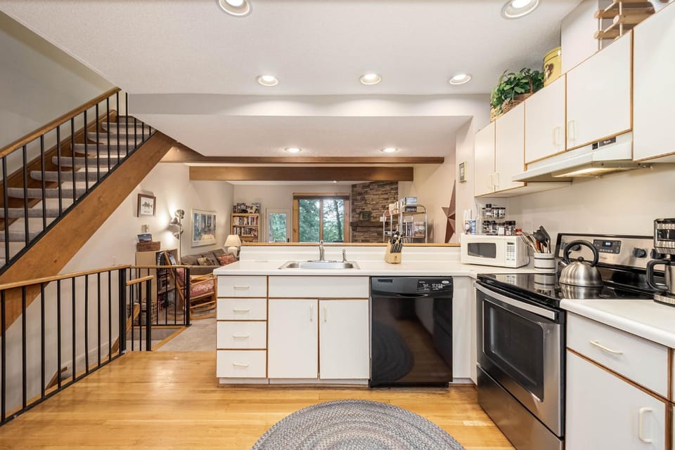 Kitchen or kitchenette, Living room, Seating area, Garden view, microwave, stove, kitchen