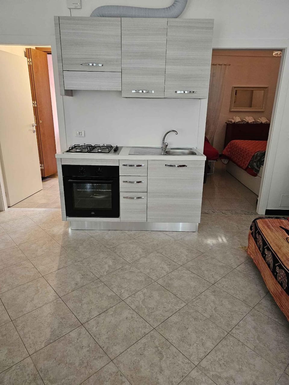 Kitchen or kitchenette, oven, stove
