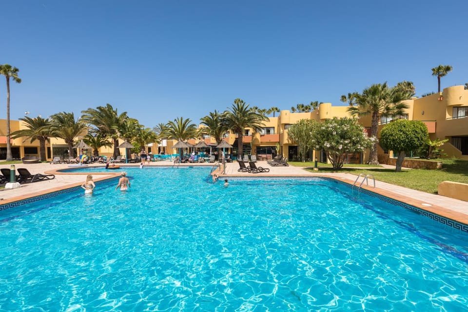 Swimming pool, sunbed