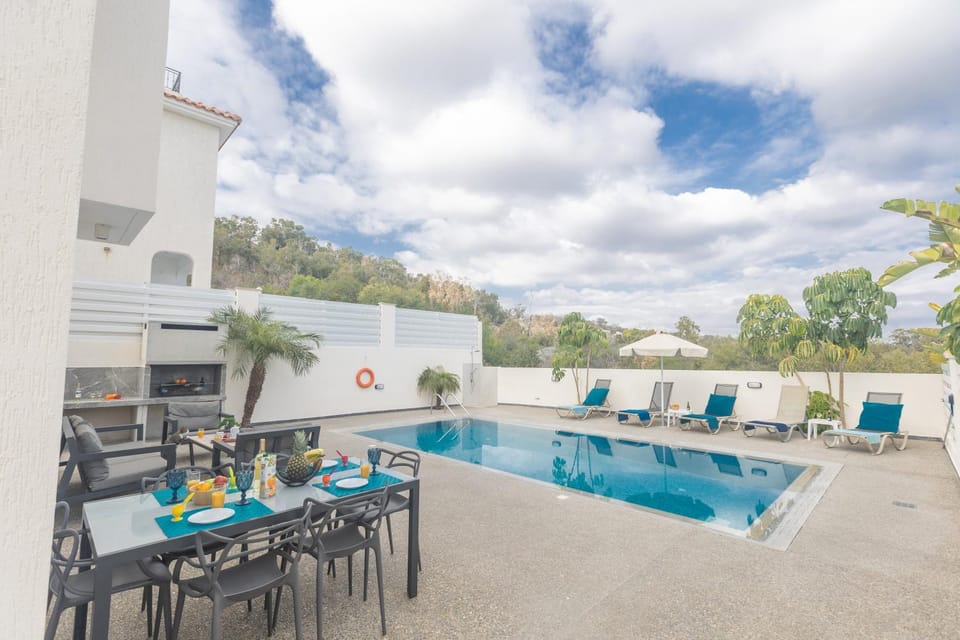 Patio, Day, Natural landscape, View (from property/room), Seating area, Dining area, Pool view, Swimming pool, sunbed
