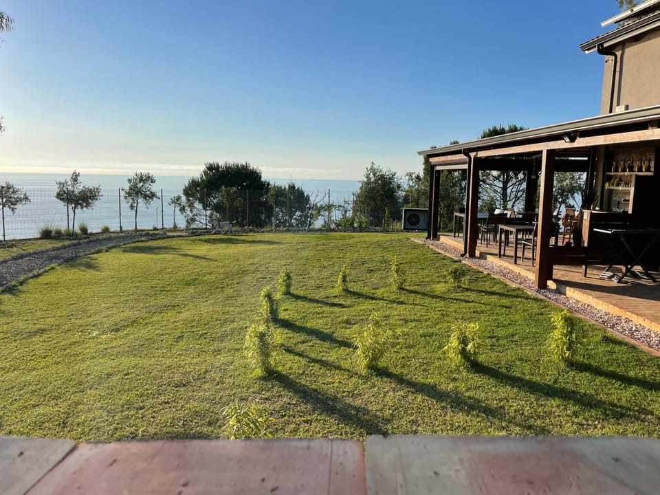Property building, Day, Natural landscape, Garden, Garden view, Sea view