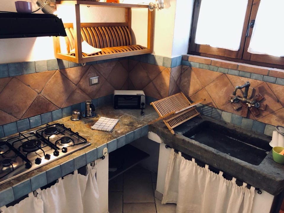 Kitchen or kitchenette, stove