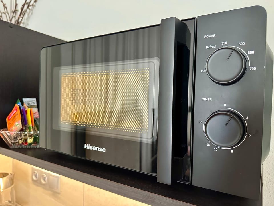 Kitchen or kitchenette, microwave