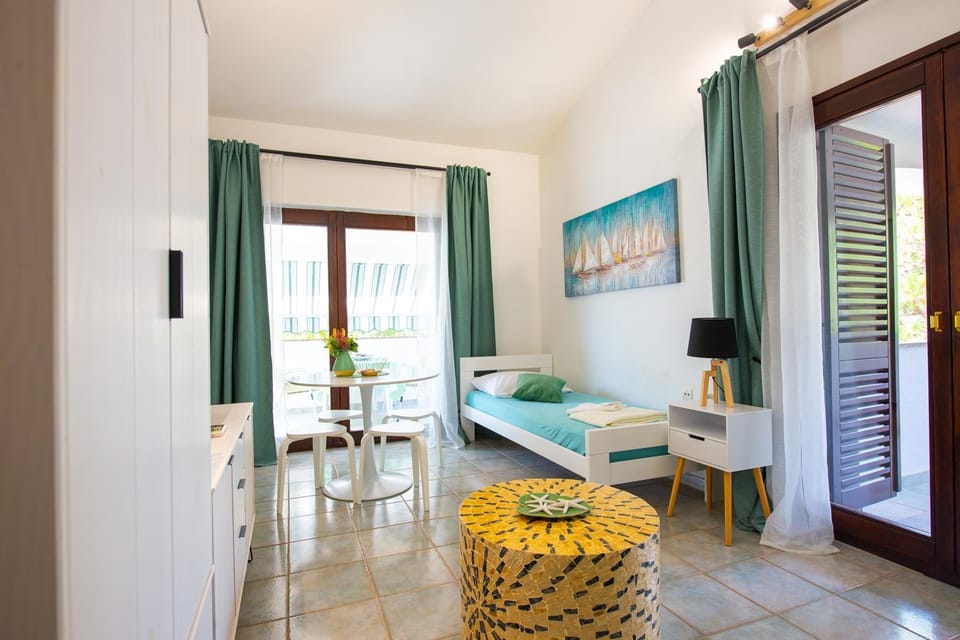 Bed, Living room, Seating area