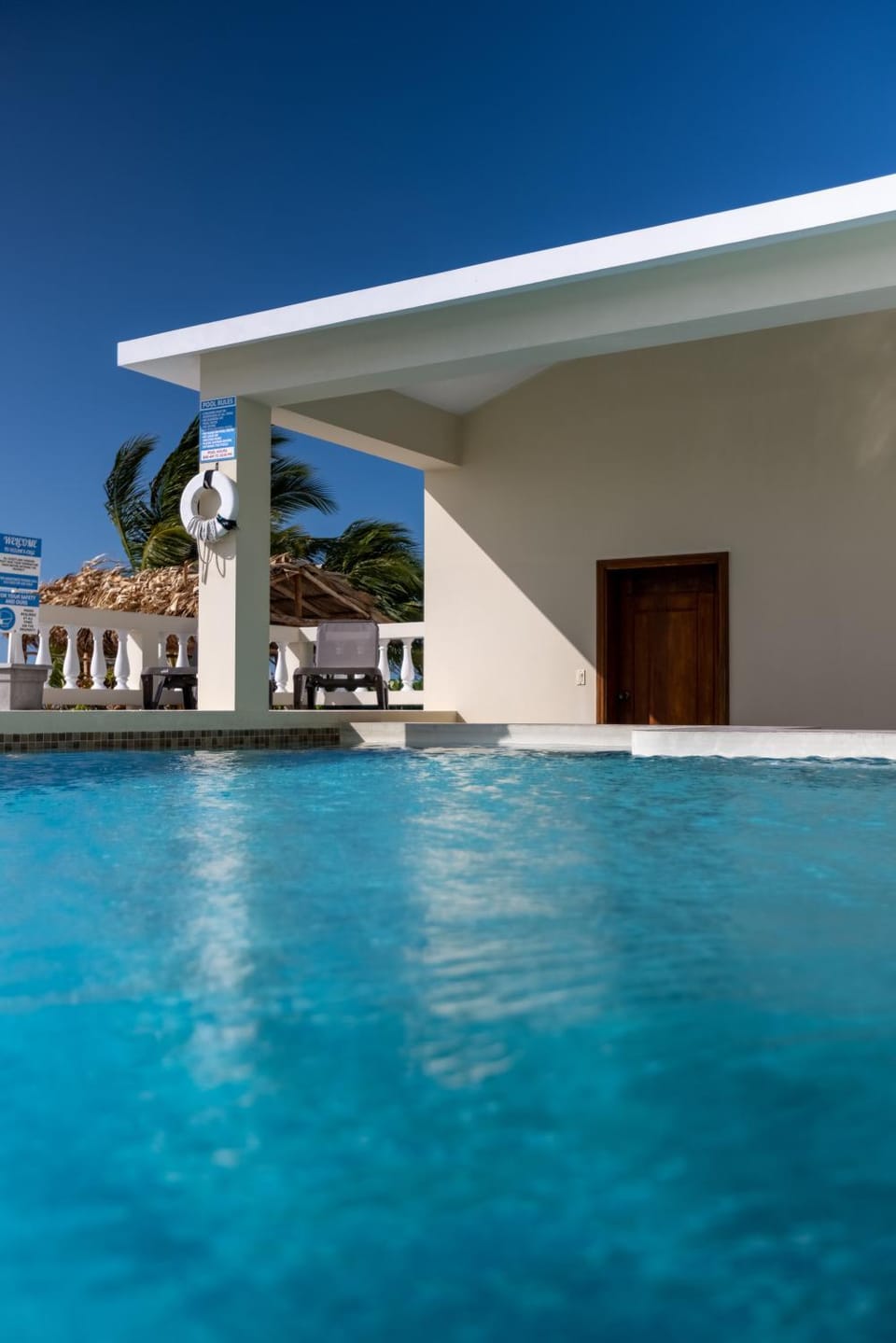 Property building, Pool view, Swimming pool, sunbed