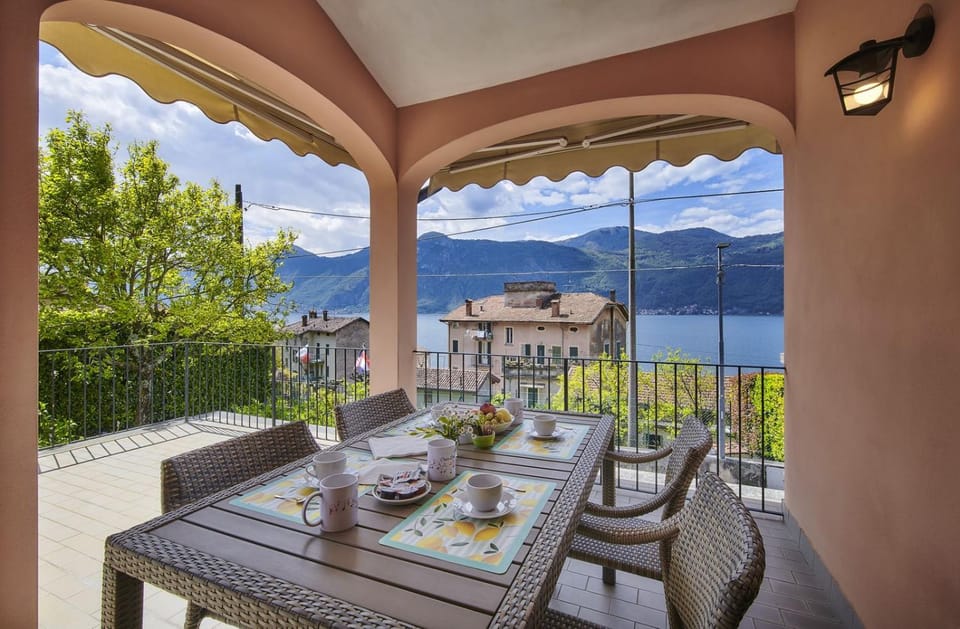 Property building, Patio, Day, Natural landscape, View (from property/room), Balcony/Terrace, Dining area, Lake view, Mountain view