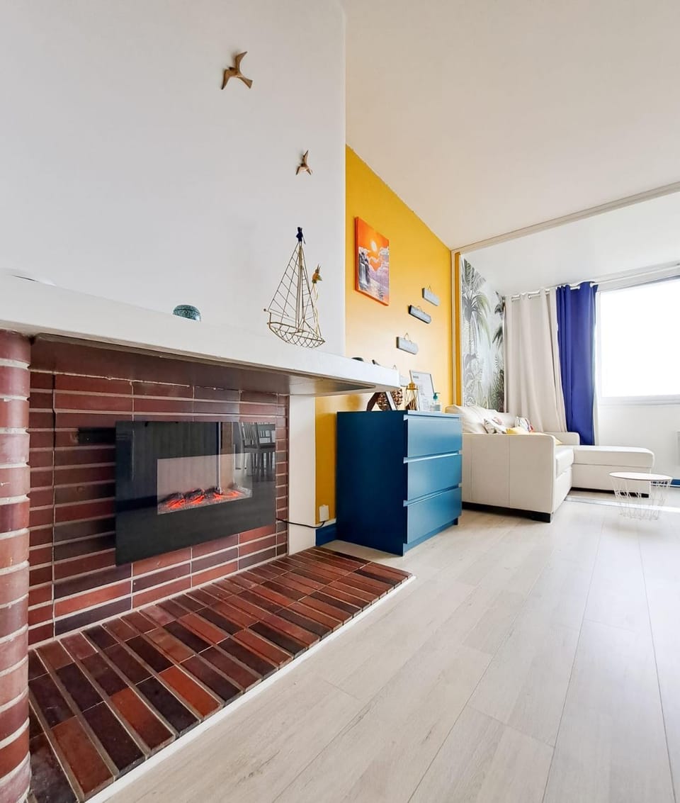 Living room, Seating area, fireplace, fireplace, storage, storage