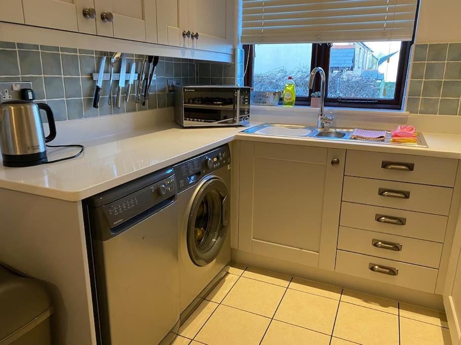 Kitchen or kitchenette, dishwasher, minibar, washing machine