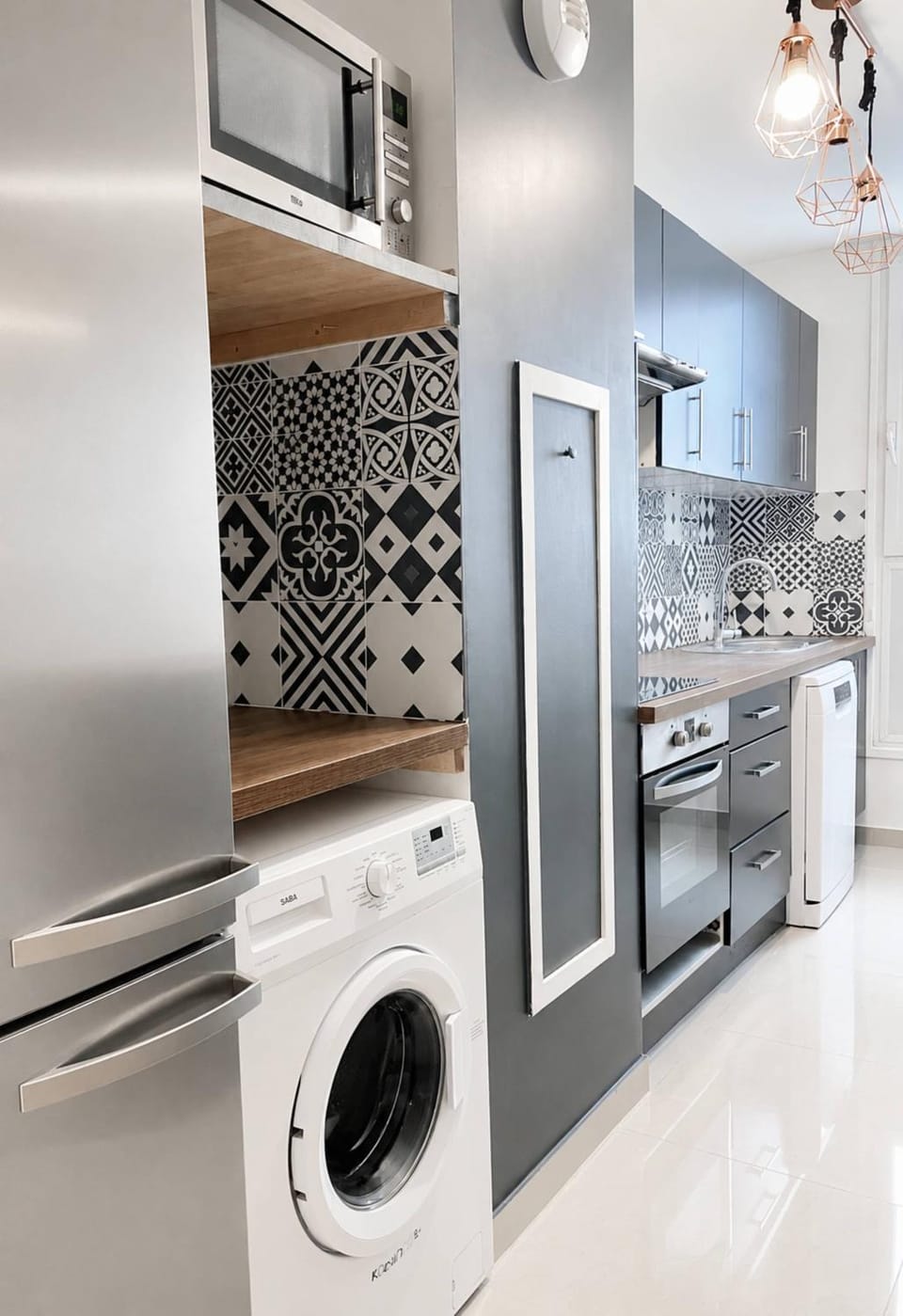 Kitchen or kitchenette, stove, washing machine