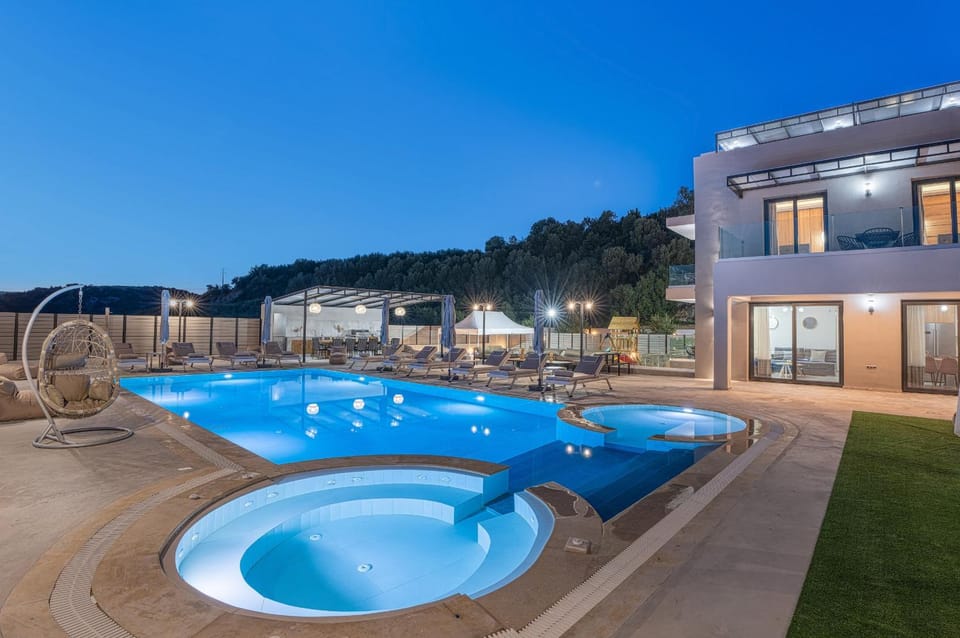 Property building, Night, Pool view, Swimming pool, sunbed