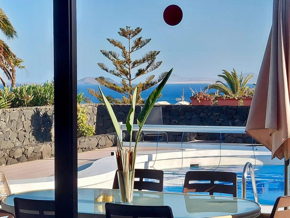 Property building, Living room, Swimming pool