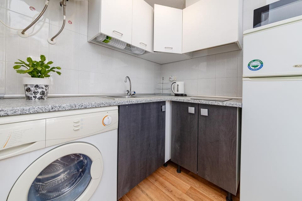 Kitchen or kitchenette, stove