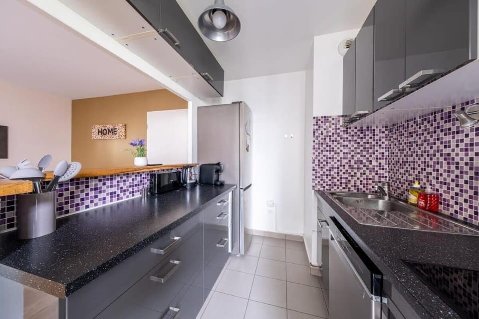 Kitchen or kitchenette, dishwasher, oven, stove, toaster