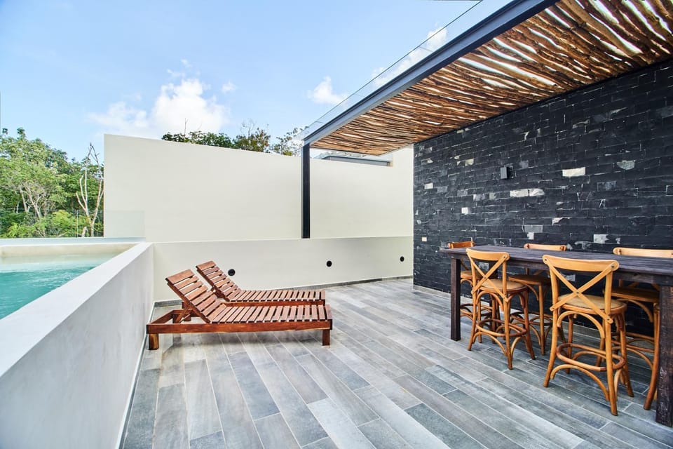 Property building, Dining area, Swimming pool, sunbed