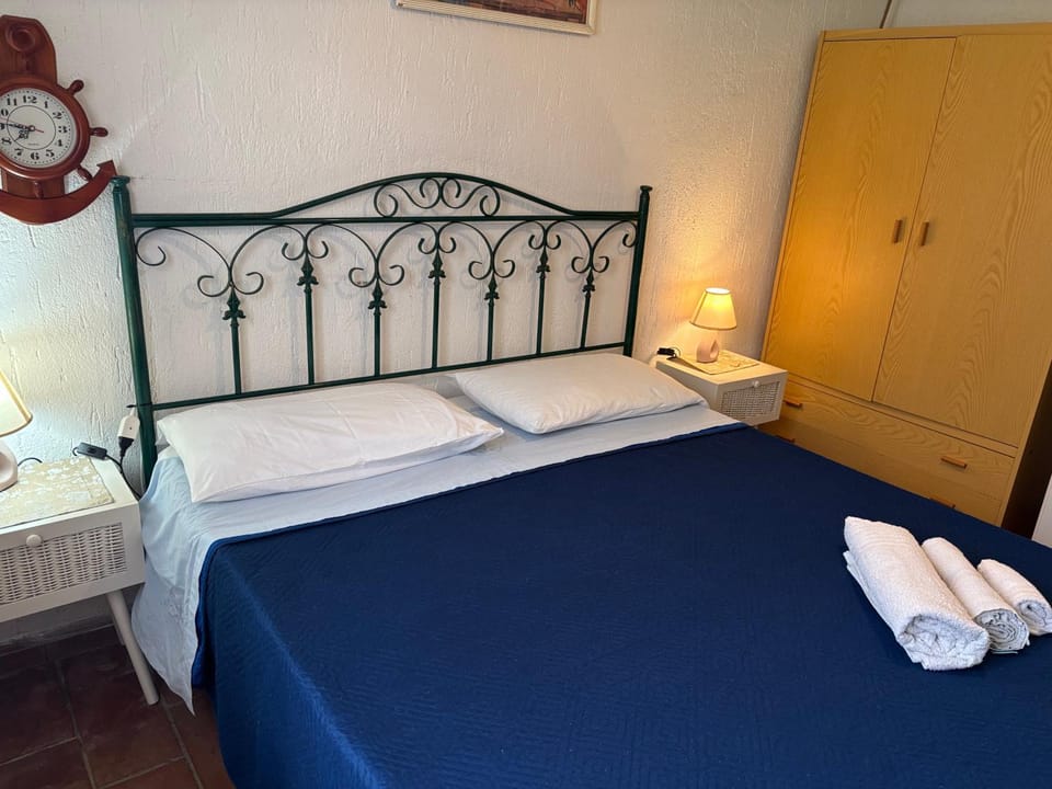 Bed, Photo of the whole room, Bedroom, towels, wardrobe