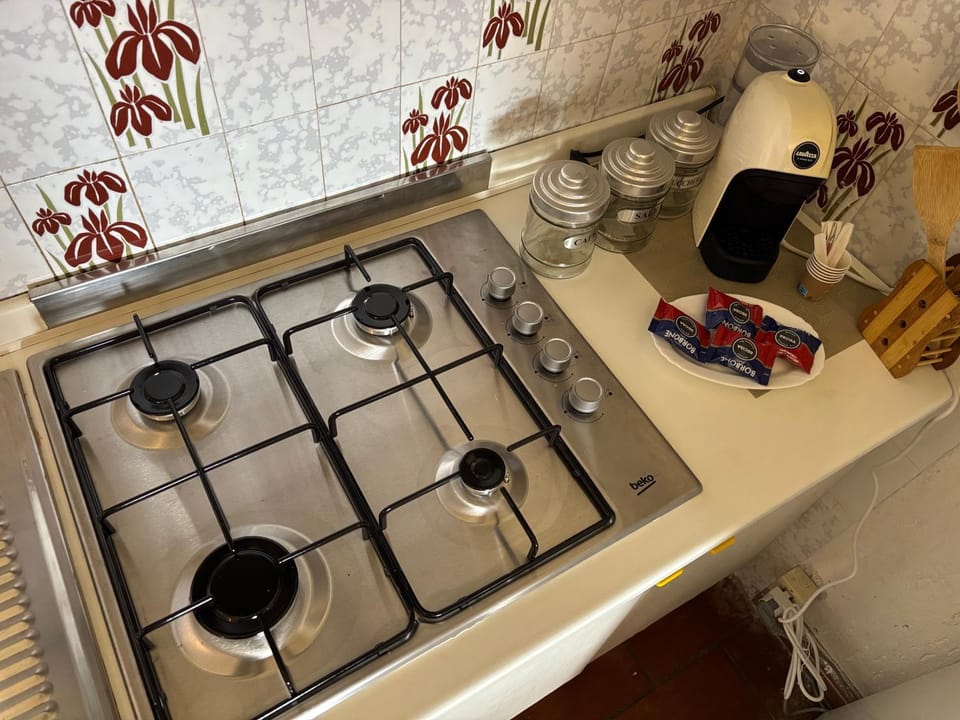 Kitchen or kitchenette, stove
