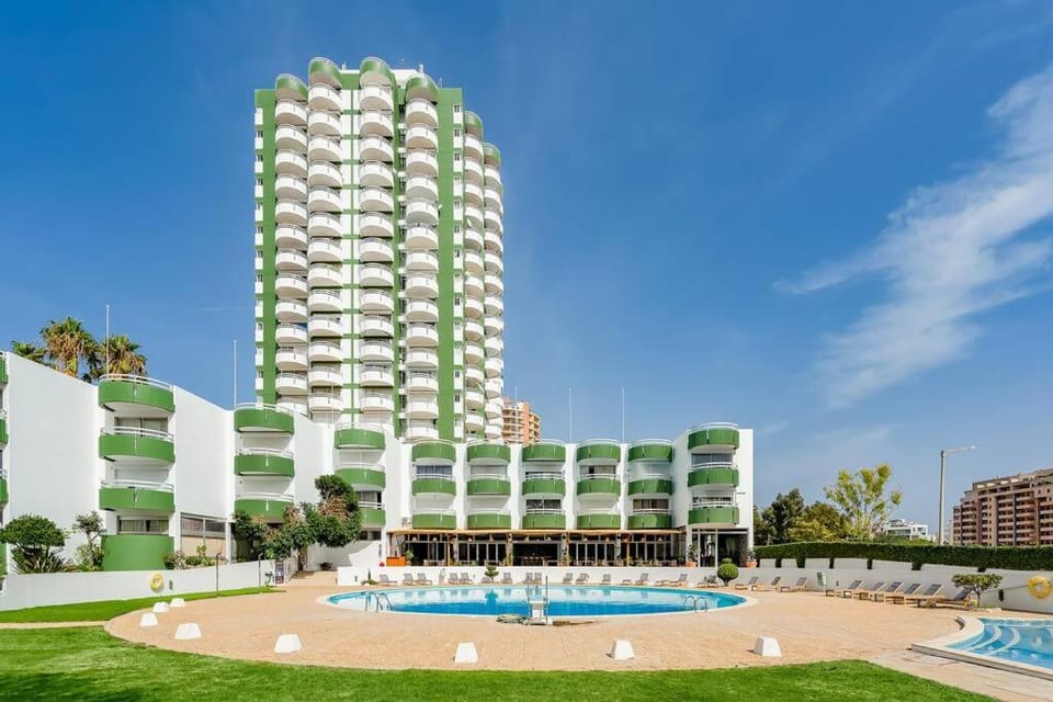 Property building, Pool view, Swimming pool, sunbed