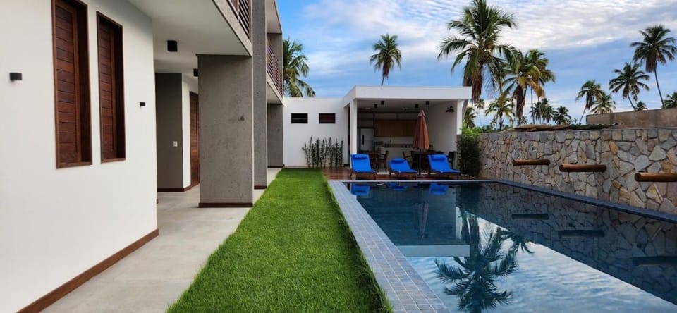 Property building, Patio, Day, Pool view, Swimming pool, sunbed