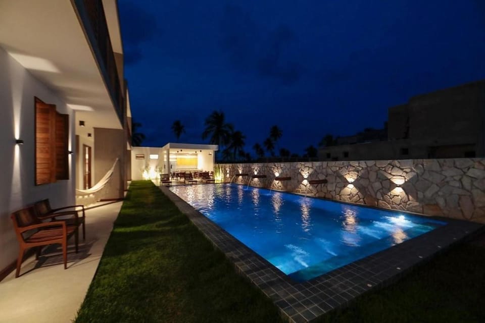 Property building, Night, Pool view, Swimming pool, sunbed