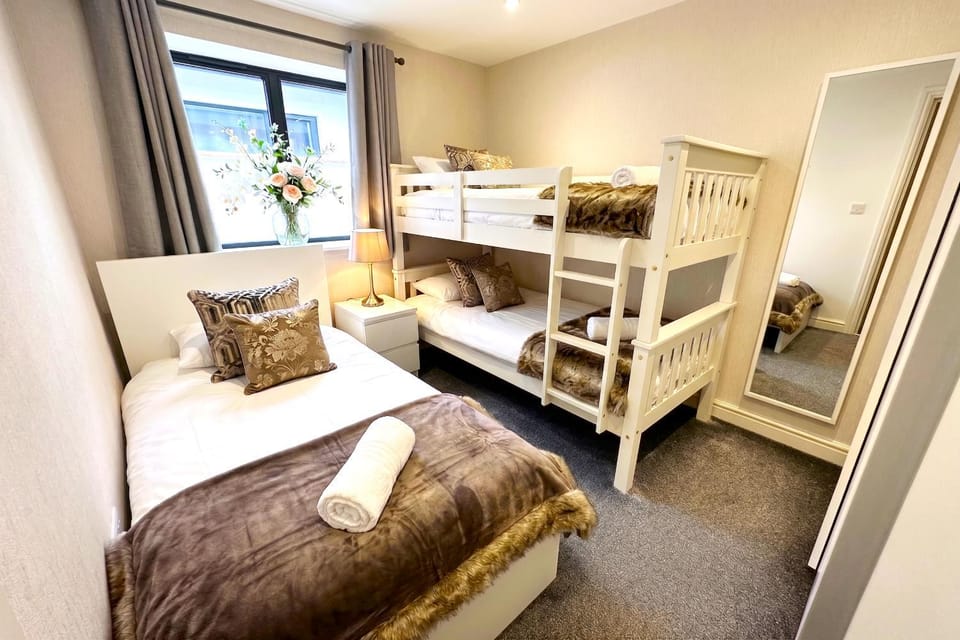 Bed, Photo of the whole room, Bedroom, bunk bed, towels, wardrobe