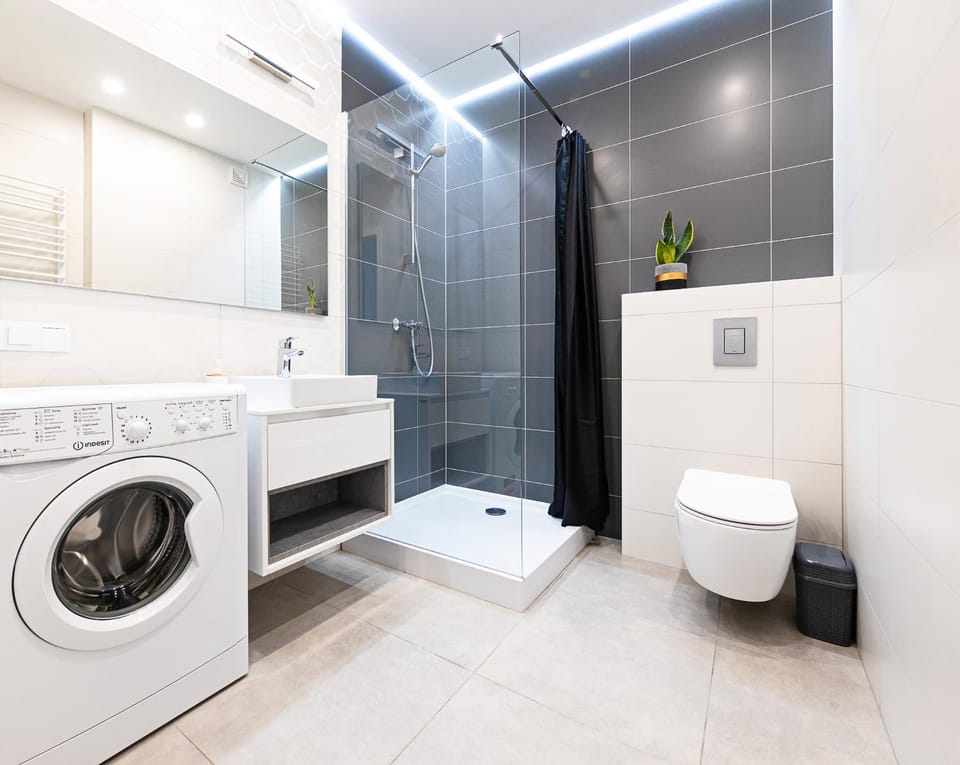 Shower, Toilet, Bathroom, towels, washing machine, dryer