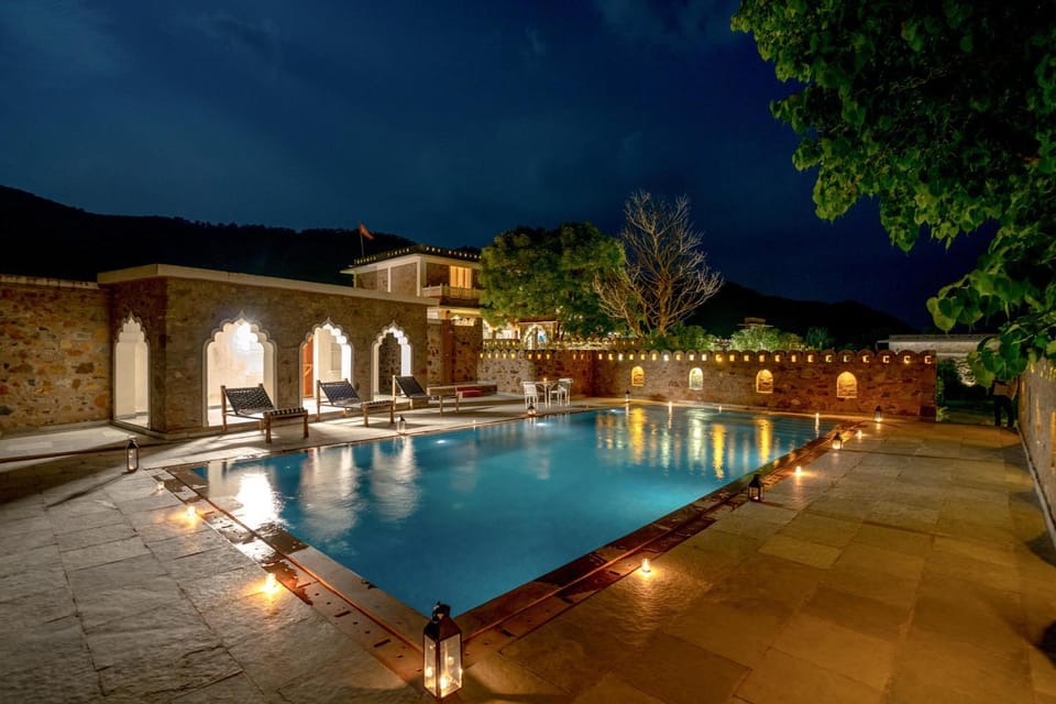 Property building, Night, Pool view, Swimming pool, sunbed