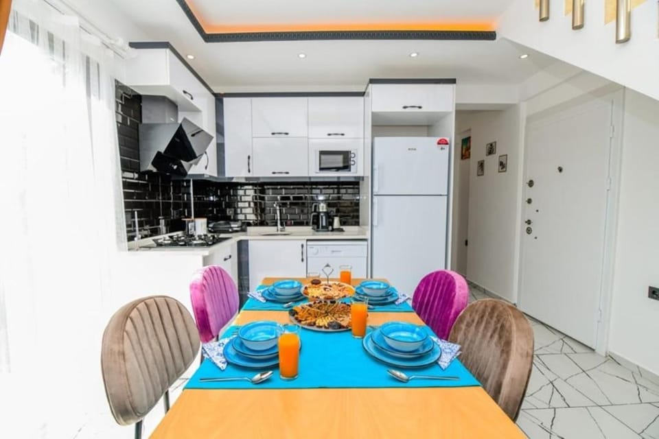 Kitchen or kitchenette, Seating area, Dining area, oven, stove, kitchen
