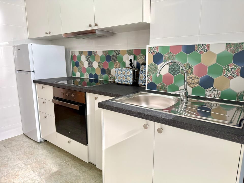 Kitchen or kitchenette, oven, stove