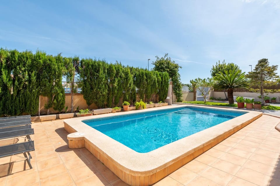 Property building, Living room, Swimming pool