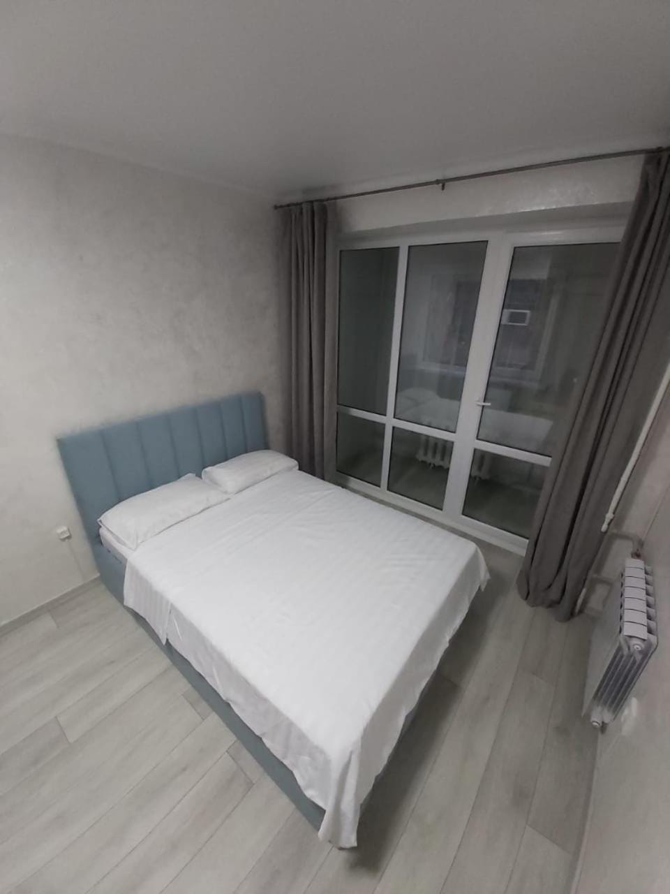Светлые апартаменты напротив Выставки Apartment in Almaty