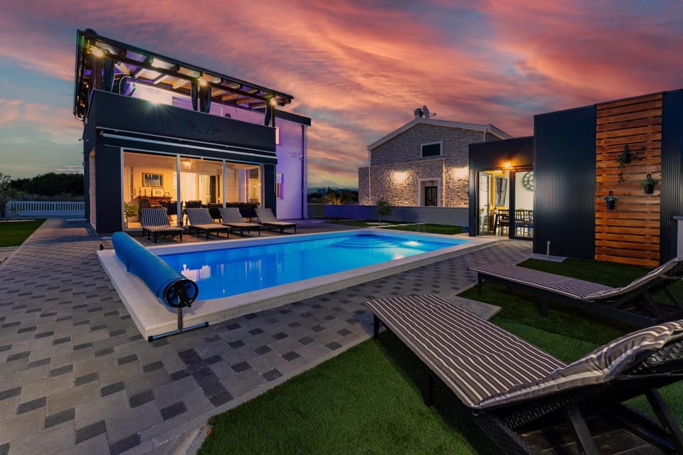 Property building, Patio, Night, Pool view, Swimming pool, Sunset, sunbed